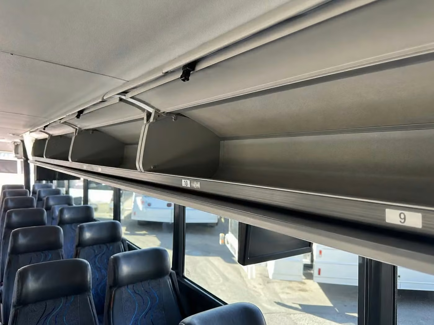 martinez 25 passenger minibus overhead storage