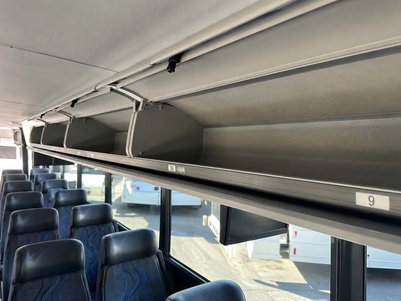 martinez 28 passenger minibus overhead storage