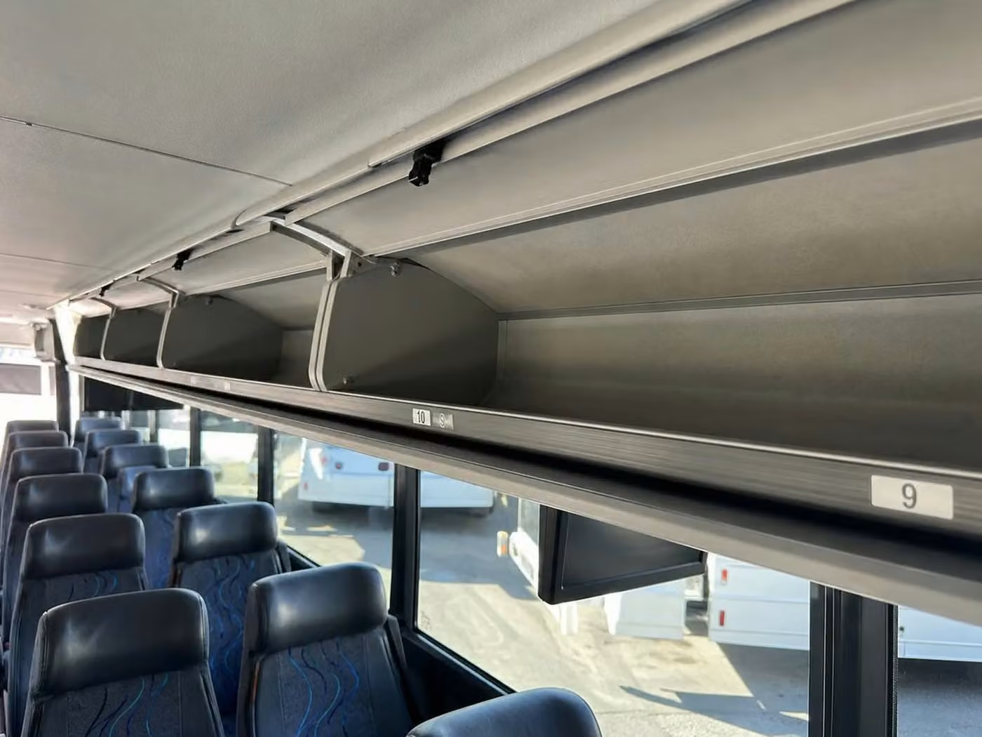 martinez 56 passenger charter bus overhead storage